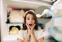 L’ho visto fare alla mamma e ho chiesto a cosa servisse: ora che lo so, anche io metto sempre del dentifricio nel congelatore donna stupita, congelatore e dentifricio