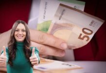 mani che contano euro e donna felice