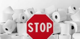 rotoli di carta igienica con segnale di stop