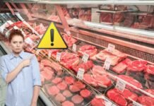 bancone della carne con donna spaventata e simbolo giallo con punto esclamativo