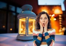 lanterna e donna stupita