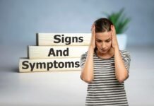 donna preoccupata e scritta in legno segnali e sintomi