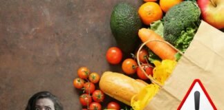 Ne vanno ghiotti gli italiani, ma è allarme a tavola: contaminazione da pesticidi sacchetto della spesa con frutta, verdure e pane, donna spaventata, simbolo pericolo