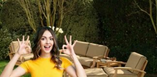 donna che fa ok e giardino arredato