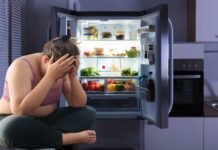 Se vuoi perdere peso evita questo alimento a cena: ti rovina frigorifero aperto donna triste