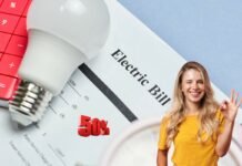 donna felice, bolletta elettrica, lampadina