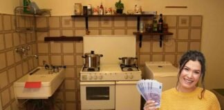 cucina piccola antica con donna con banconote in euro