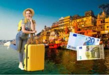 vista delle case dell'India, donna con la valigia, 25 euro