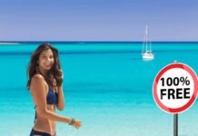 È la migliore spiaggia d’Italia e ha un mare mai visto: qui è sempre gratis! mare con barca, donna in costume, 100% free