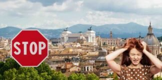 vista dall'alto di roma, segnale stop e donna arrabbiata