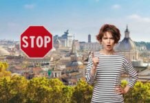 paesaggio di roma, segnale stop e donna arrabbiata