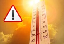 termometro caldo e segnale pericolo