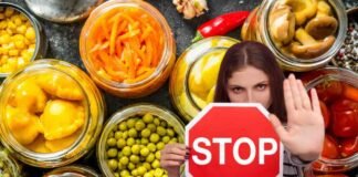 Allerta alimentare, ci risiamo: non consumate questo cibo sott’olio barattoli conserve e donna con segnale stop