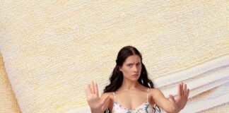 asciugamano ingiallito e donna che dice no