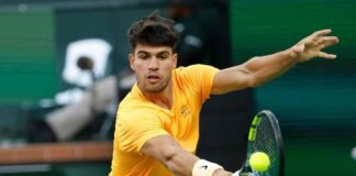 Carlos Alcaraz impegnato in un match